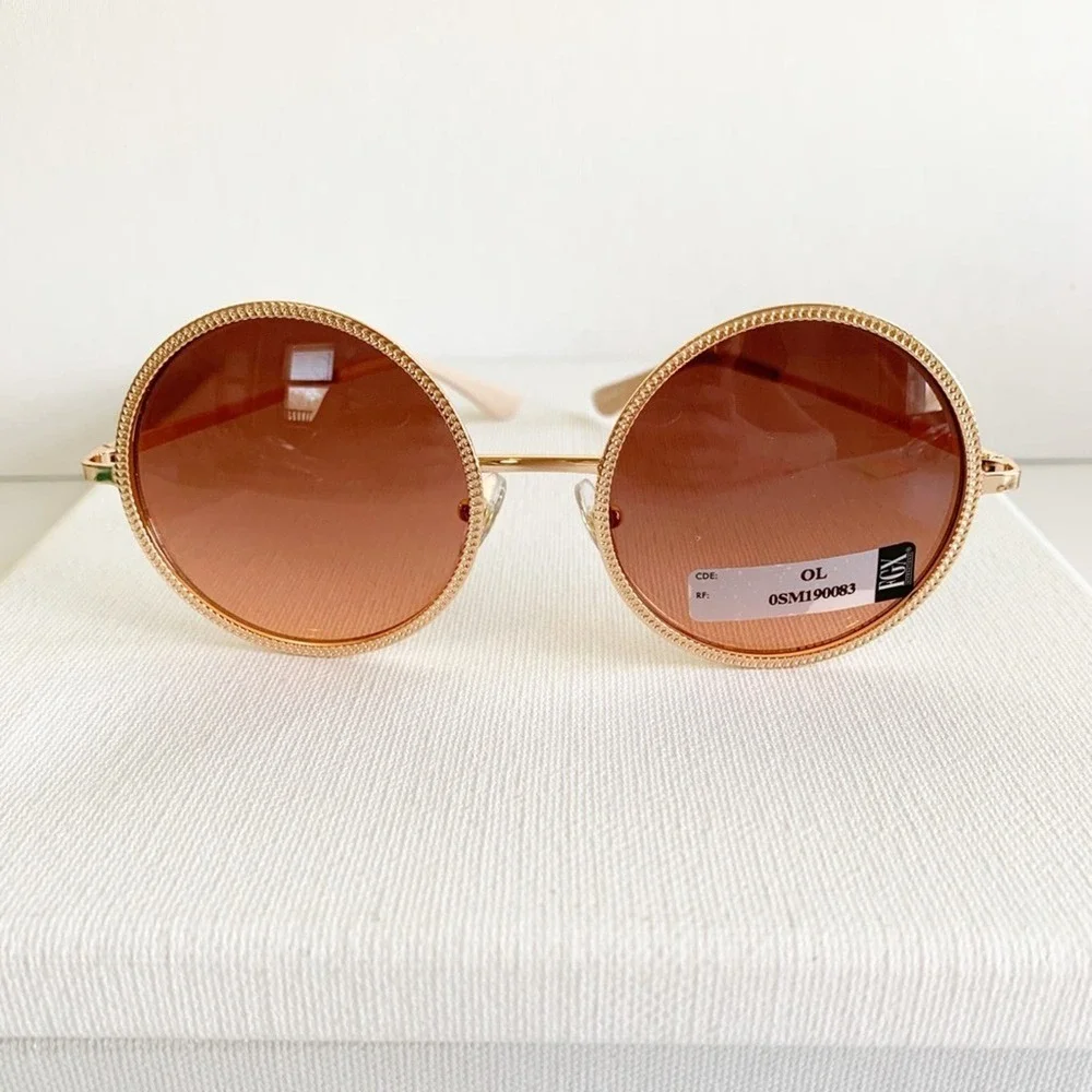New with tage FGX rose gold round sunglasses